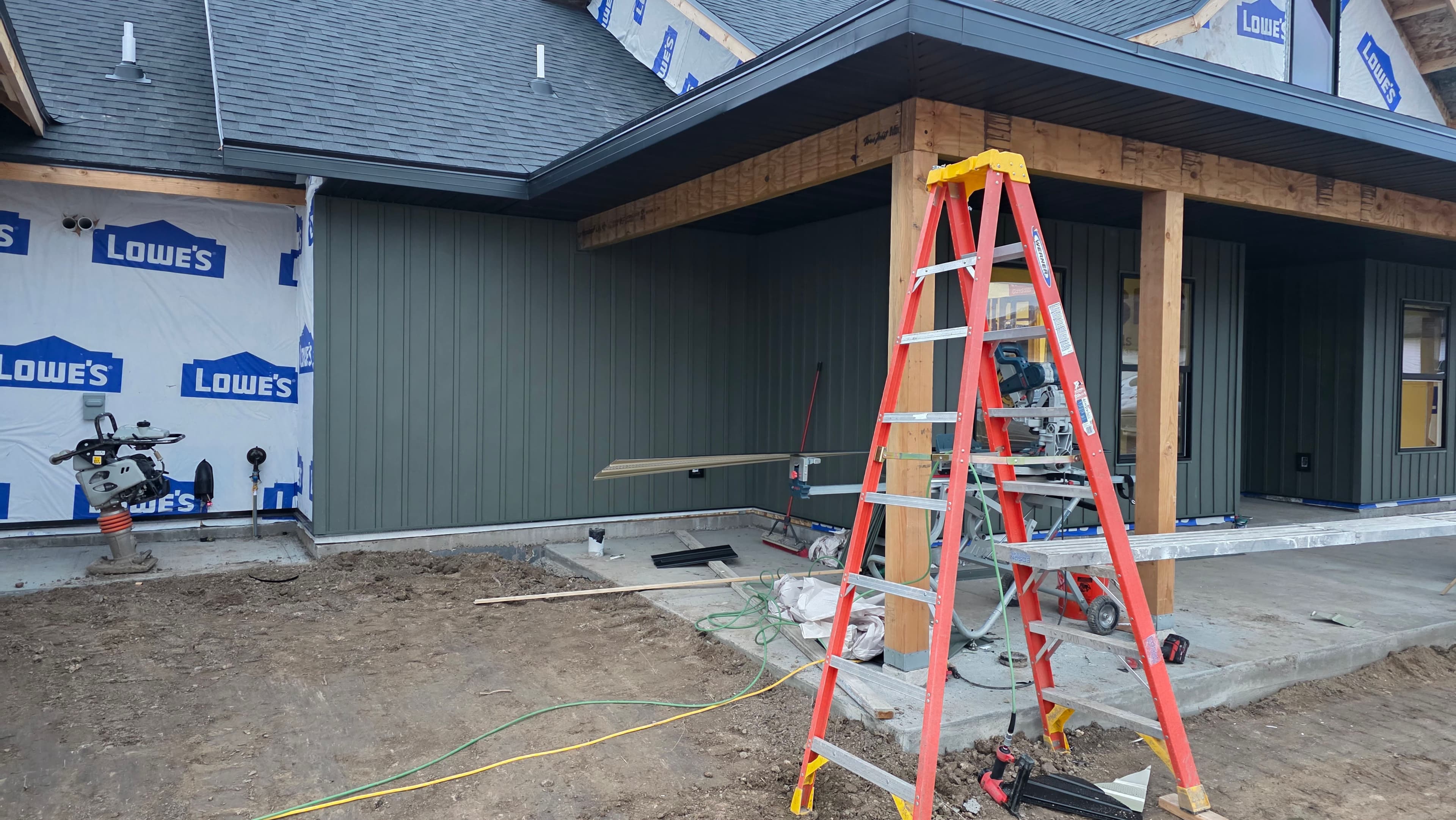 Project Dark Green Siding and Modern Interiors with Edson Builders image