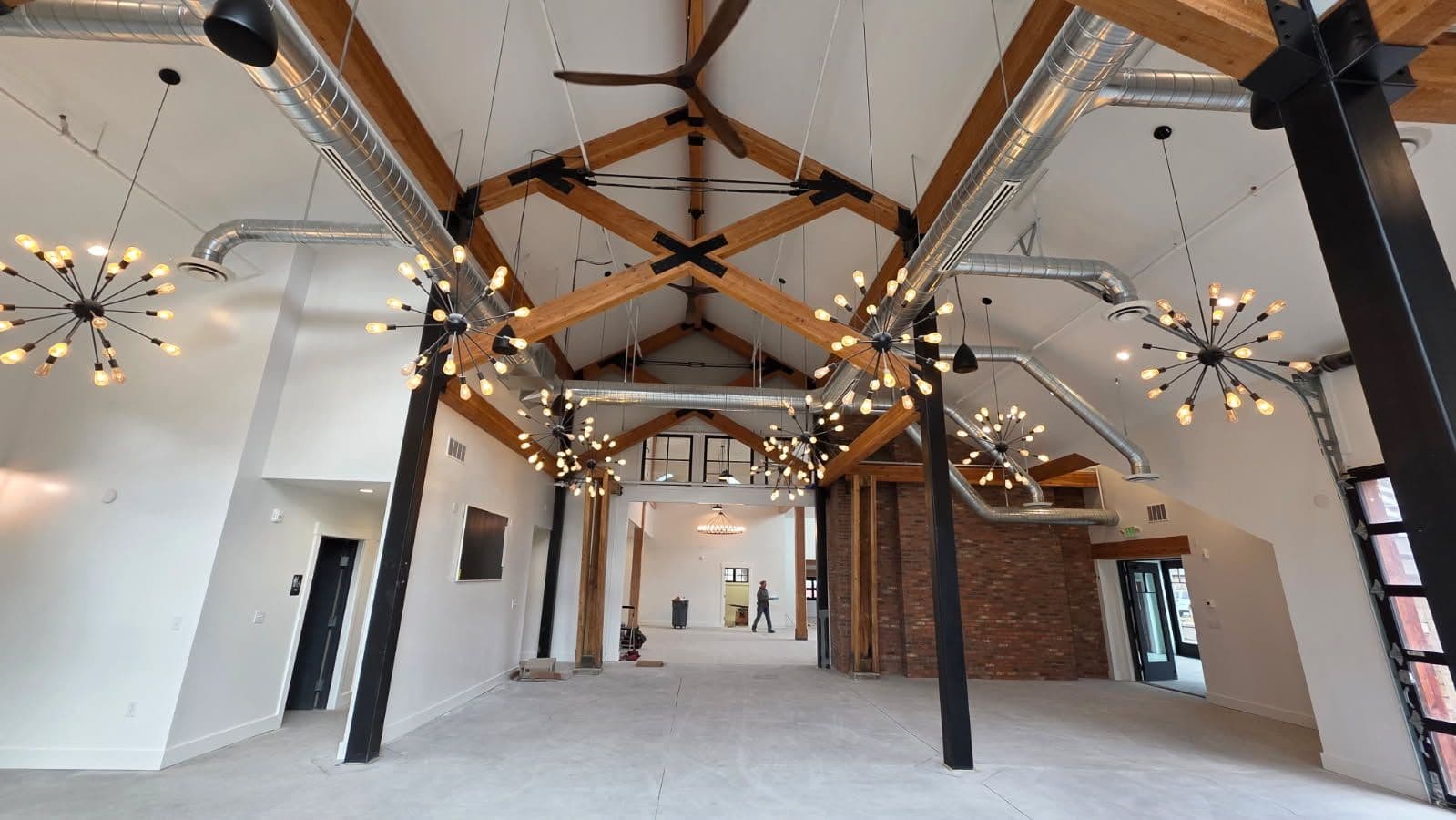 Gallery photos for Modern Industrial Interior with Exposed Beams and Ductwork: Image #1